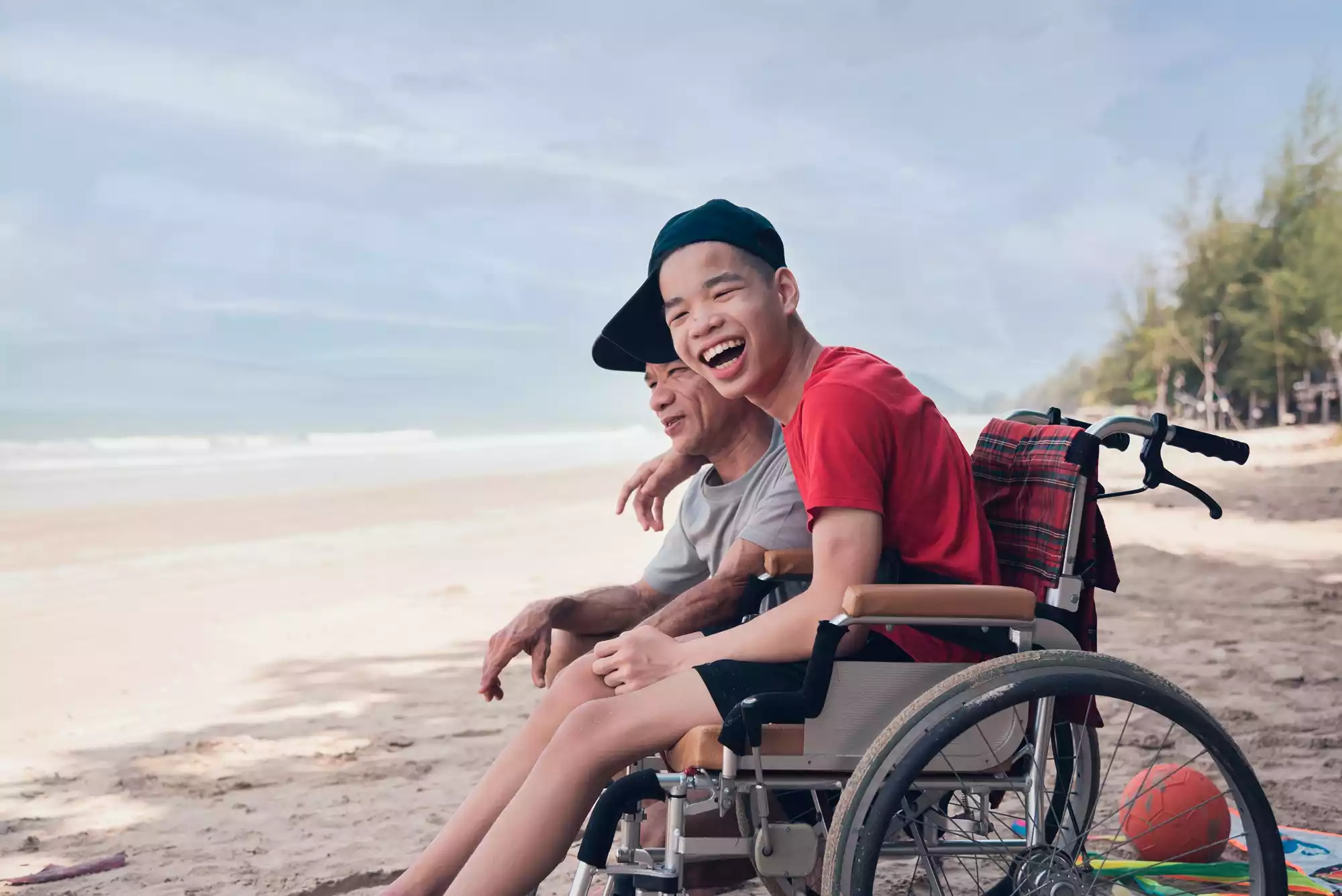 disabled-child-on-wheelchair-smiling-face-and-hug-2025-01-08-09-24-52-utc (1)