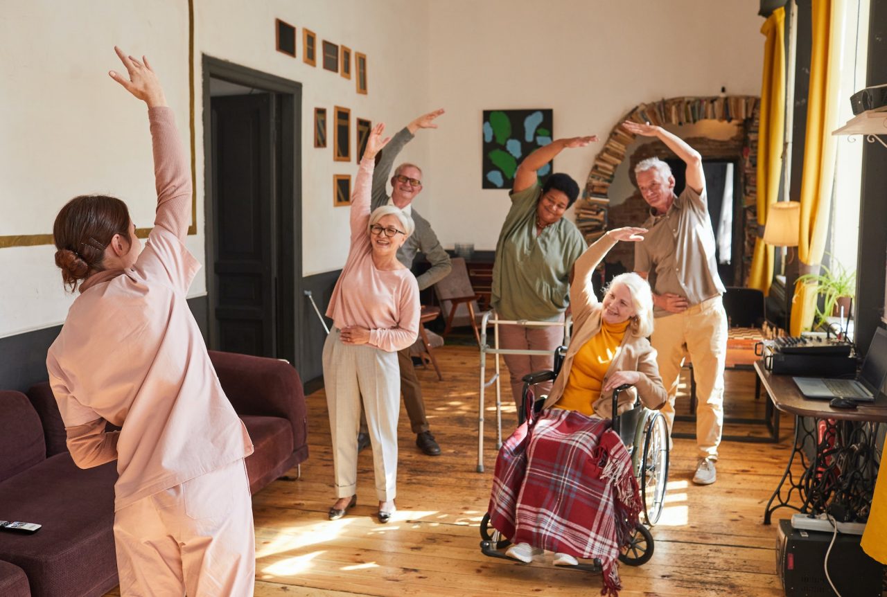 senior-people-stretching-in-retirement-home.jpg
