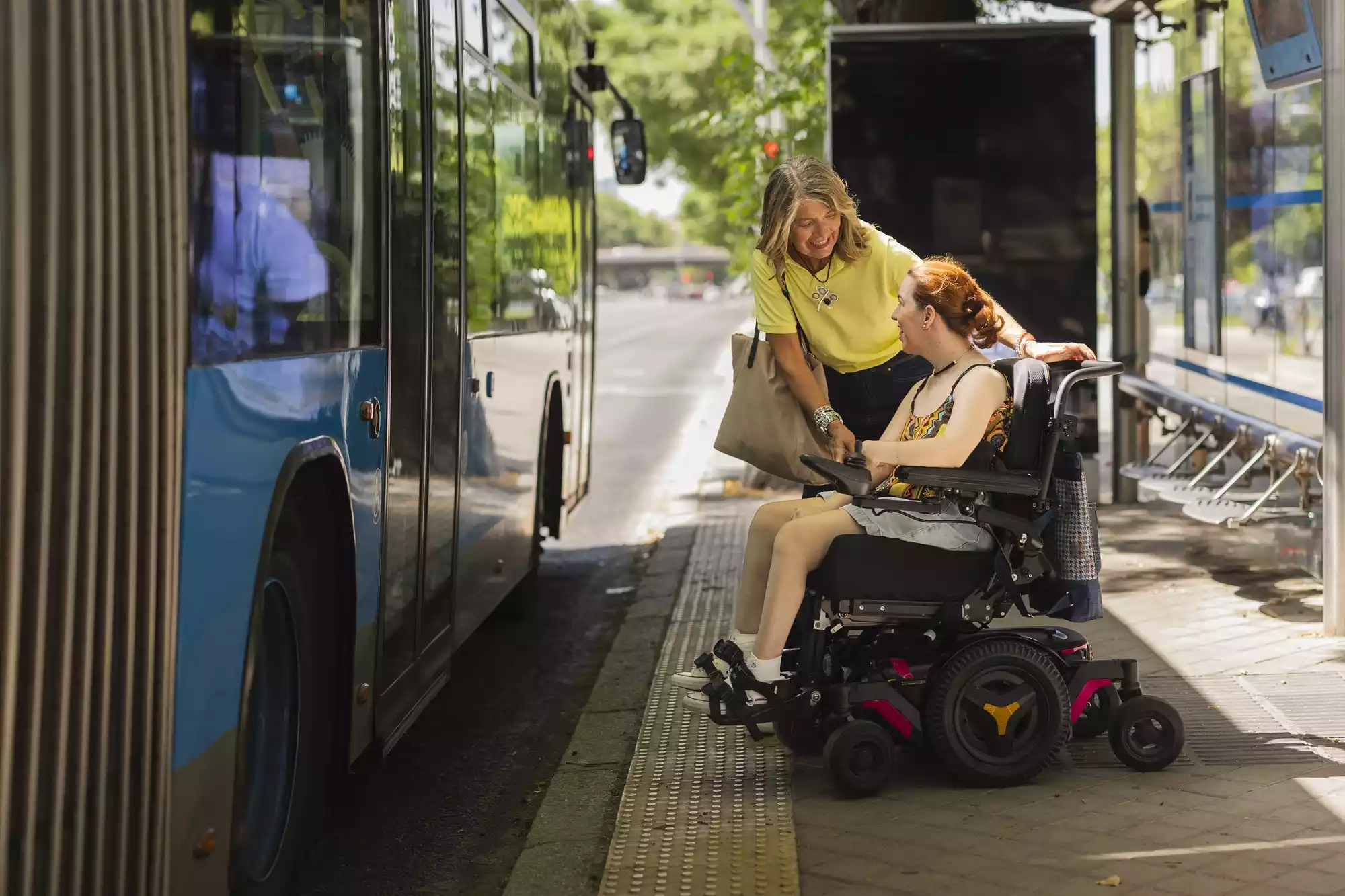 woman-helping-disabled-girl-on-wheelchair-to-board-2025-06-24-19-26-34-utc (1)