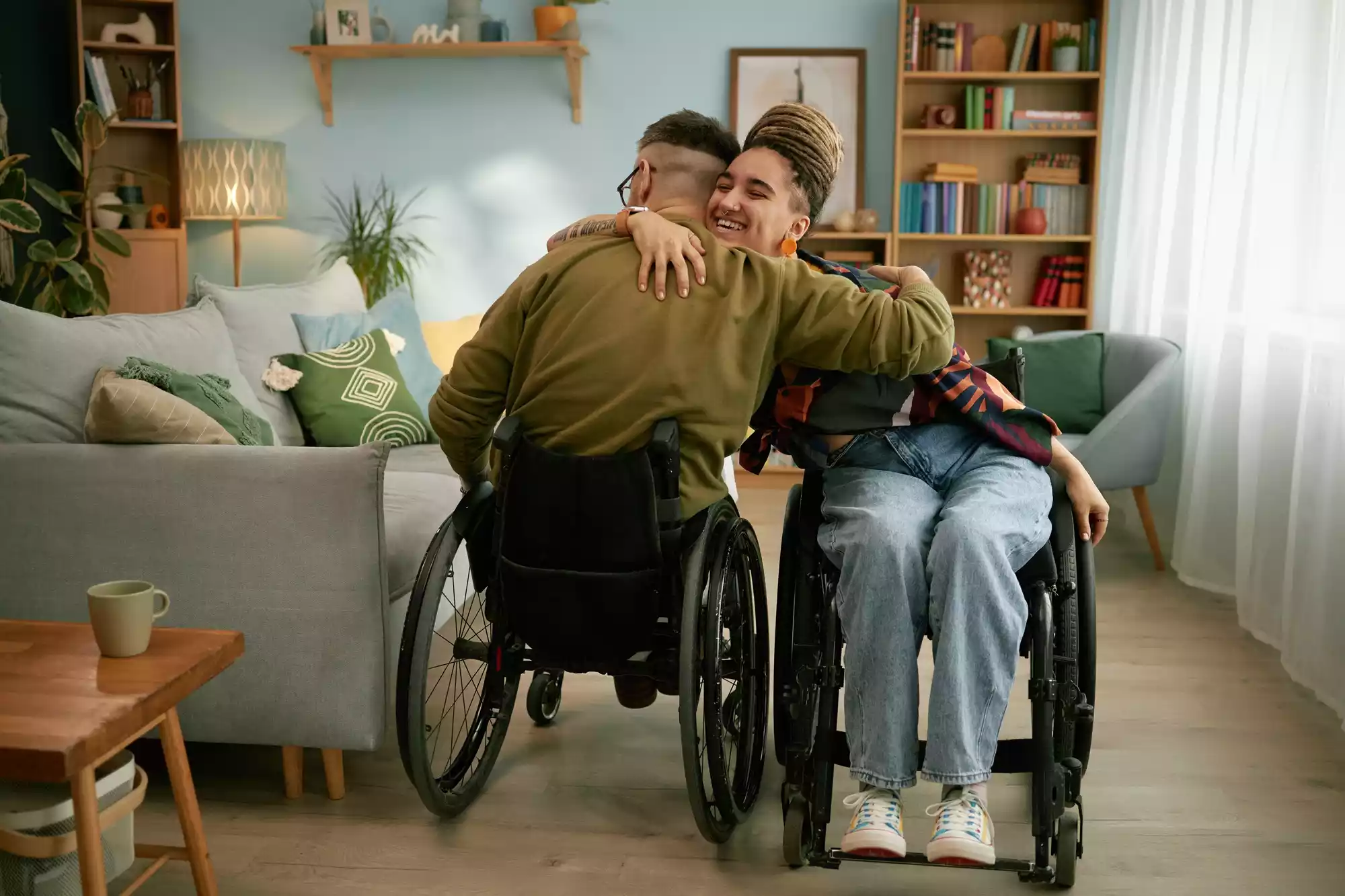 young-smiling-woman-in-wheelchair-hugging-friend-w-2025-06-08-01-50-45-utc